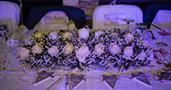 The couple's table decorated with flowers